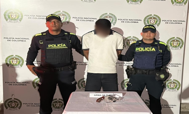 capturado con un arma de fuego