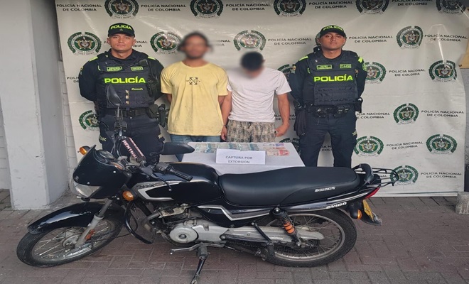 Dos capturados y dinero incautado