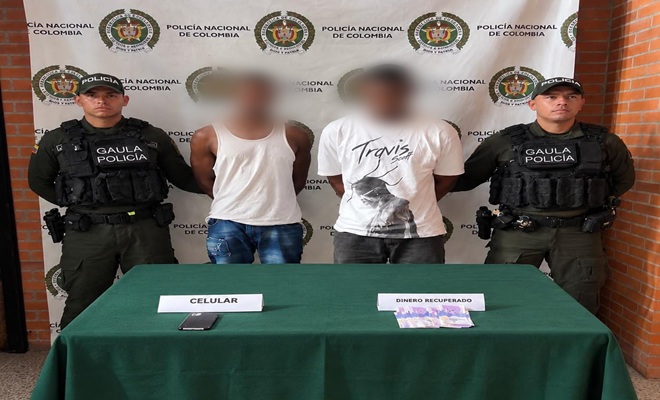 Dos policías y dos capturados por el delito de extorsión