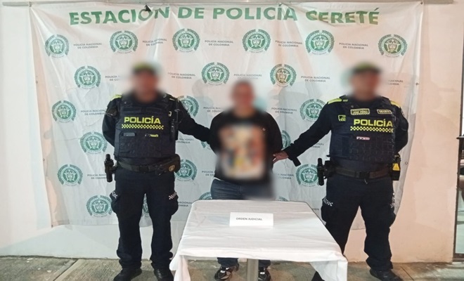 Policías y un sujeto capturado