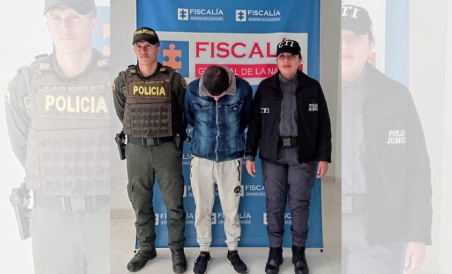 Persona capturada-policías custodiando 